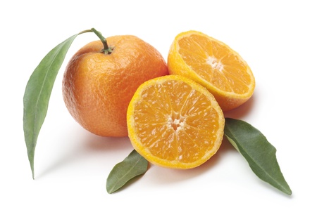 oranges with slice one, on white backgroundの写真素材