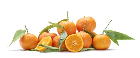 group of tangerines with a slice, on white backgroundの写真素材