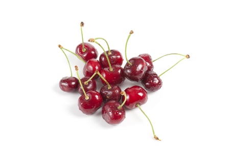 wet cherries, on white backgroundの写真素材