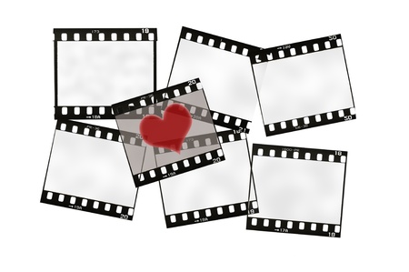 frame of 35mm film strip with heart, isolated on whiteの写真素材