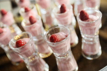 raspberry cream in small glassesの写真素材