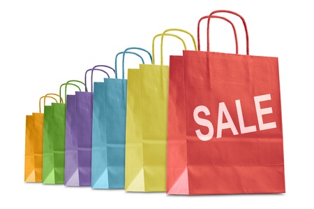 colorful shopping bags with written sale, isolated on whiteの写真素材