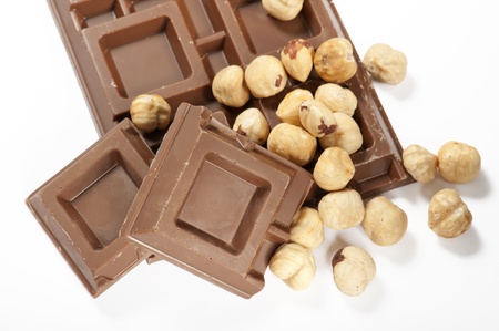 chocolate bar with nuts, on white backgroundの写真素材