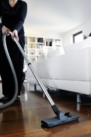 woman who cleans the floor of the houseの写真素材