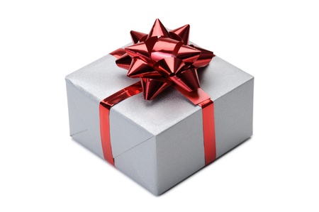 gift box with bow and red ribbon on white backgroundの写真素材