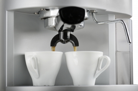 coffee machine makes two coffeeの写真素材