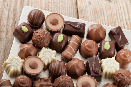 assorted chocolates confectionery on silver tray