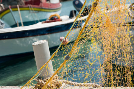 fishing nets stretched out on the pier