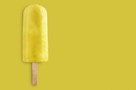 lemon ice cream on yellow backgroundの写真素材