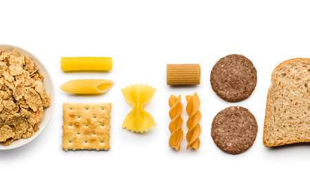 variety of bakery and wholemeal products on white background
