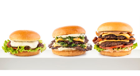 Variety of hamburgers on white shelf.の写真素材