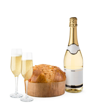 Champagne bottle with glasses and panettone. Christmas dessert on white background.の写真素材