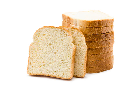 Sliced loaf of white bread isolated on white background.の写真素材