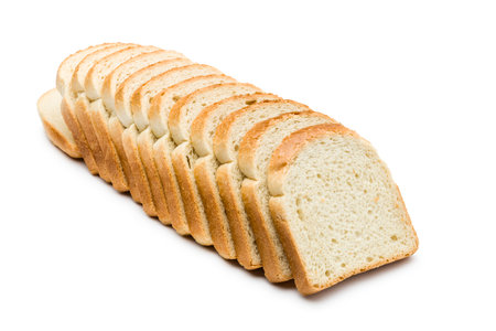 Sliced loaf of white bread isolated on white background.の写真素材