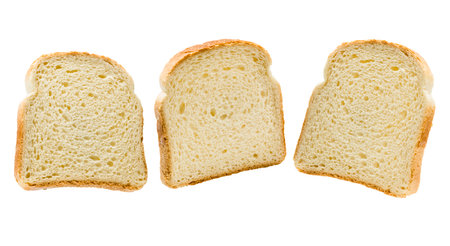Slices of white bread isolated on white background.の写真素材