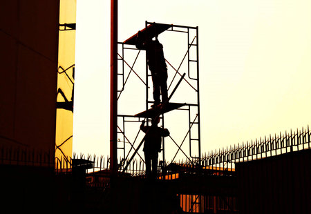 scaffold builder Construction workers working on scaffoldingの写真素材