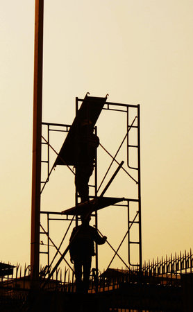 scaffold builder Construction workers working on scaffoldingの写真素材