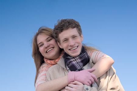 A happy couple on a sunny spring day.の写真素材