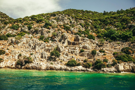 Paradise Islands with turquoise water and mountains.の写真素材