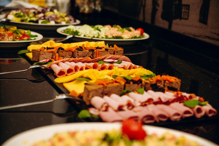 Mouth-watering,colorful dishes on the table.Delicious meat snacksの写真素材