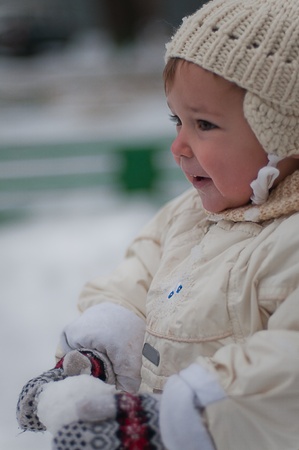 Little girl with snowballの写真素材