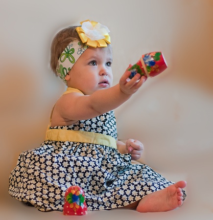 Little girl with matrioshkaの写真素材