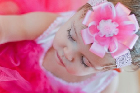 Little girl in pink dressの写真素材