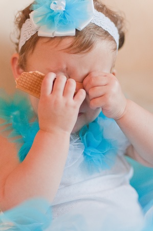 Little girl closes her eyesの写真素材
