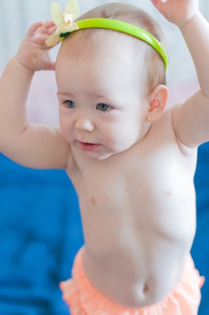 Little girl wears her headbandの写真素材