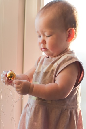 Little girl with christmas toyの写真素材