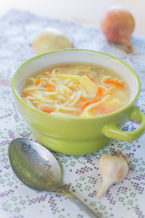 The vertical view of the plate with noodle soupの写真素材