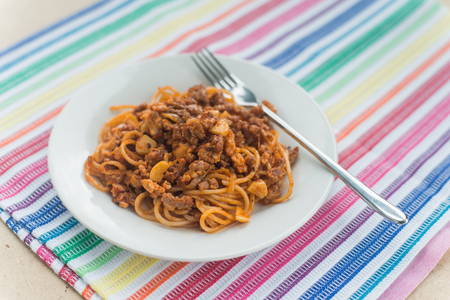 Spaghetti with meat in the white plateの写真素材