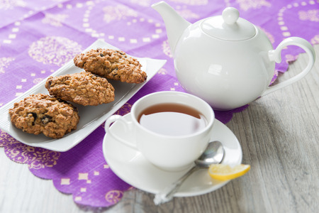Breakfast with the oatmeal cookies and lemon teaの写真素材