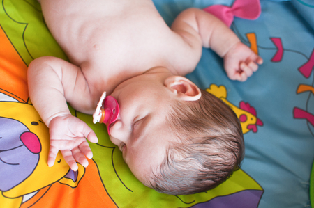 Horizontal portrait of the sleeping babyの写真素材