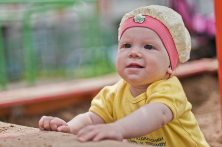 the Little smiling baby in hat horizontal  portraitの写真素材