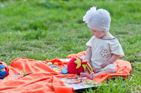 Little girl in the cute white hat portraitの写真素材