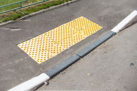 Braille Blocks in the pedestrian guiding the blinds walks. Traffic and urban life safety.の写真素材