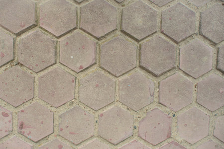 Top view of the hexagonal gray street tile background texture