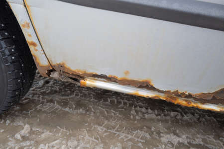Rusted old car detail. Close up picture of corroded automobileの写真素材