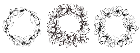 Set of floral circular frames. Graceful wreaths of wild flowers and leaves. Black and white illustrationのイラスト素材