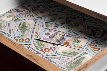 New hundred dollar bills in the drawer. Savings. Financial concept.の写真素材