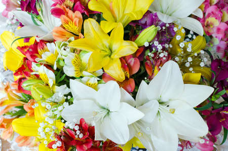 Large bouquet of different flowers. Floral background. Pattern of flowers. Lot of natural flowers in colorful composition.の写真素材