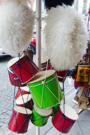Tourist souvenirs - drums and traditional Georgian hats made of sheep's wool.の写真素材