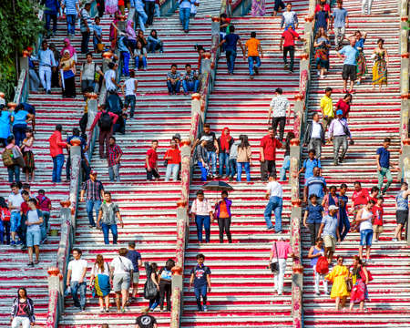 Kuala Lumpur, Malaysia, Batu Caves, 2018-02-16:  People move up stairs to visit sightseeing, concept of tourism and curiosity.のeditorial素材