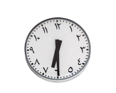 Modern clock round shape with Arabic circulars on dial and hands, showing the time 6: 30. Isolated...