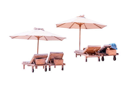 Wooden beach chairs with umbrellas isolated on white background. Beach sun lounger isolated.の販売画像