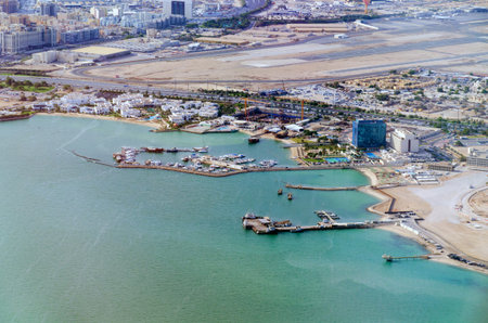 Aerial view at Doha, Qatar. View from the Persian Gulf to the runway of Hamad International Airport.