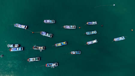 Group of fishing boats in the sea.  Wide photo, aerial  view.の写真素材