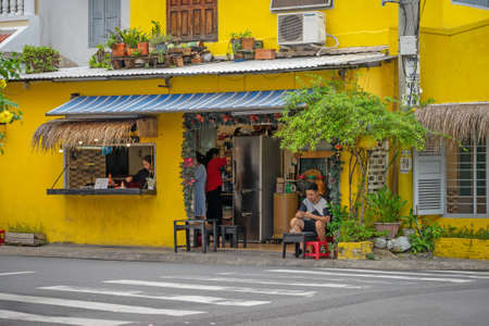Beautiful and cozy street restaurant with people. Nha Trang, Vietnam: 2020-10-23のeditorial素材
