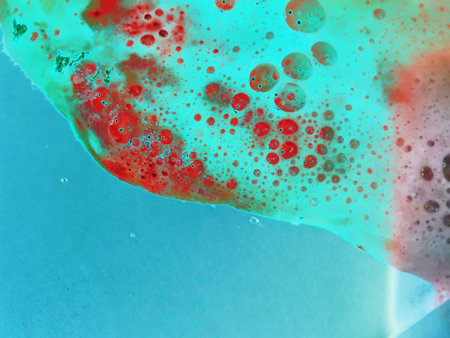 Macro shot of red and blue bubbles in water. Abstract background